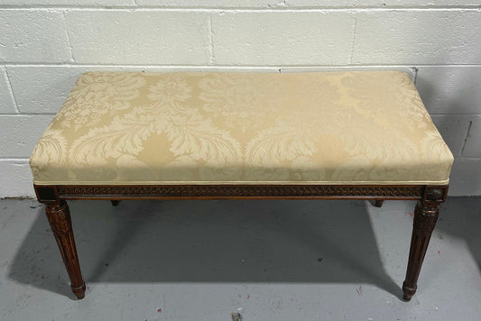 Nicely carved French Louis XVI style Walnut upholstered stool. The stool is in good condition and the frabic is in good used condition, please view photos as they help form part of the description.