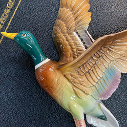 Set of three vintage flying duck wall ornaments. Measurements are for largest duck.