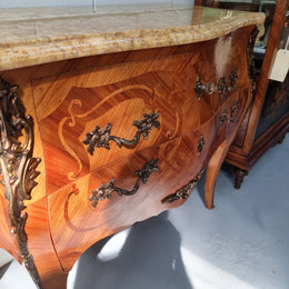 French marquetry inlaid Kingwood marble top commode. It has two drawers and beautiful mounts. Is in good original detailed condition.