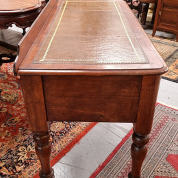 Lovely Victorian Cedar leather tooled  top desk, with five drawers on castors and of pleasing proportions. In very good original detailed condition and has been sourced locally.