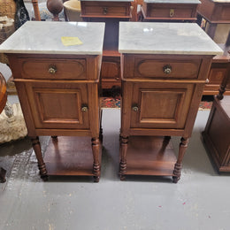 Antique French Oak Henry II white marble top bedside cabinets. They have one drawer and cupboard a long with an open shelf at the bottom. Sourced from France and in good original detailed condition.