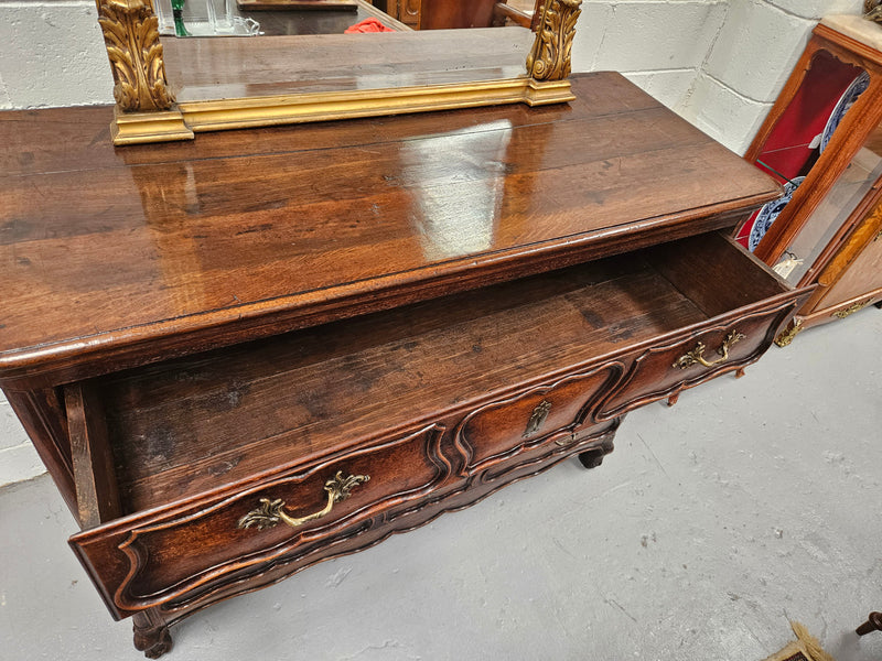 Impressive French 18th Century Louis XV three drawer Oak wooden top commode. Circa: 1770. It has been sourced from France and is in good original detailed condition.