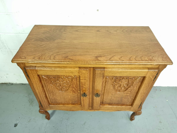 Vintage French Oak two door cabinet which would make an ideal TV cabinet or storage unit. In good original detailed condition.