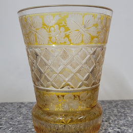 Antique Amber Bohemian acid etched and wheel engraved crystal vase. It has a stunning frieze of vine branches and a star cut base. It is in good original condition, please view photos as they help form part of the description.