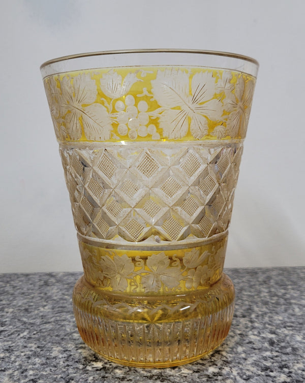 Antique Amber Bohemian acid etched and wheel engraved crystal vase. It has a stunning frieze of vine branches and a star cut base. It is in good original condition, please view photos as they help form part of the description.