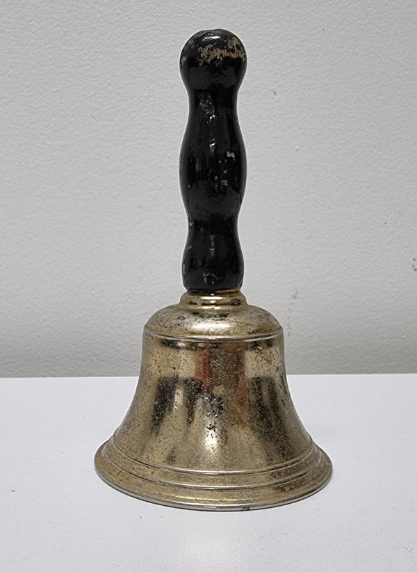 Wooden handled brass bell. It is in good original condition and has been sourced locally. Please view photos as they help form part of the description.