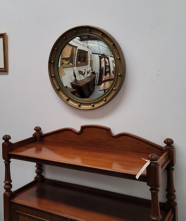 Large round French gilt framed convex mirror. It is a hard to find size with a total diameter of 67 cm. It has been sourced from France and is in good original condition.