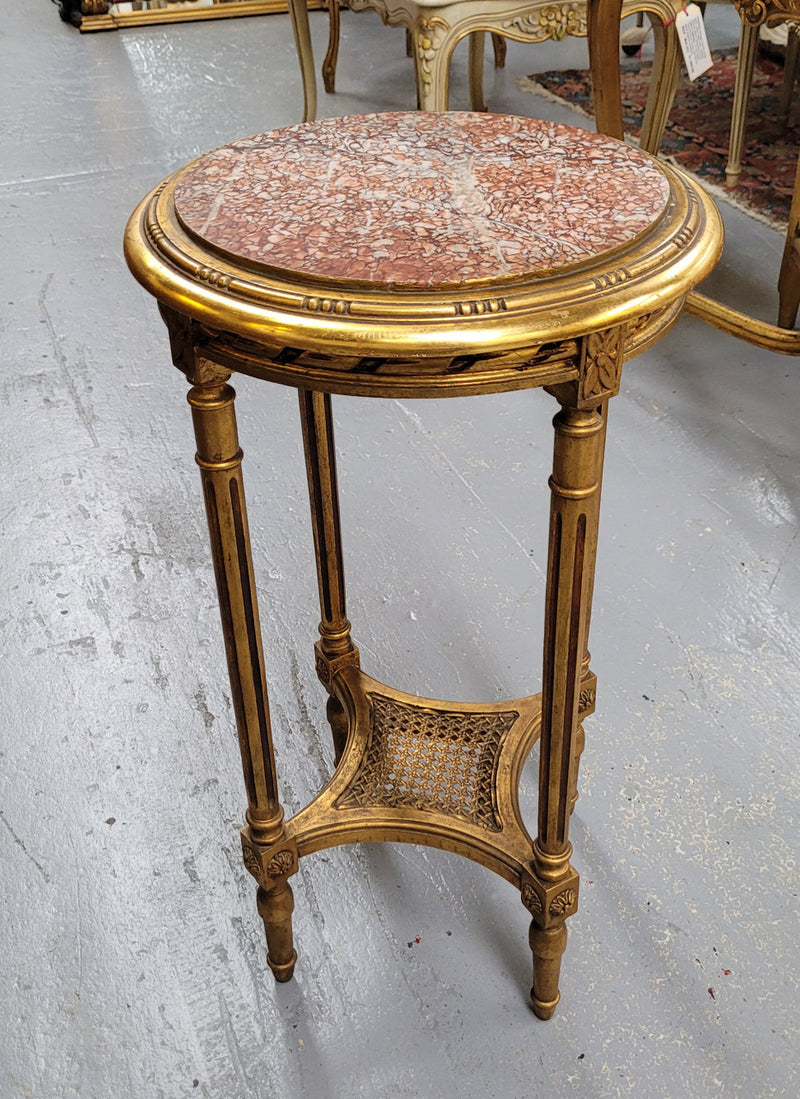 Late 19th Century French Louis XVI style round marble top side table/ lamp table. It is in good original detailed condition and has been sourced from France.