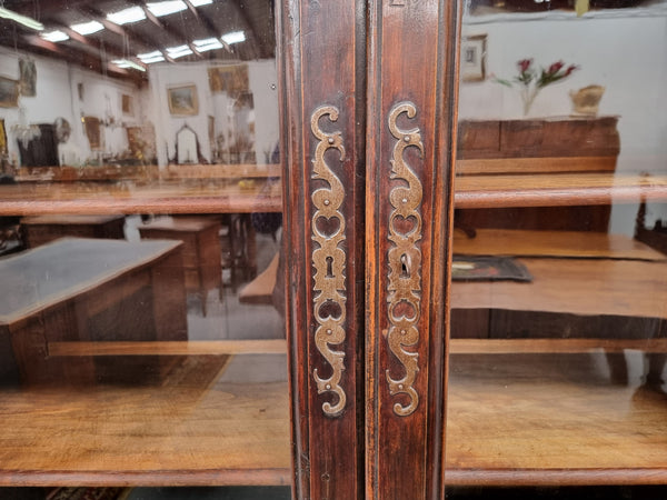 Substantial French Henry 2nd Walnut two door bookcase. It has five fully adjustable shelves and has been sourced from France. It is in good original detailed condition.