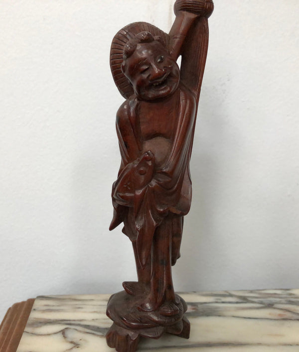 Vintage Chinese carved rosewood figure on wooden stand. In good original condition.