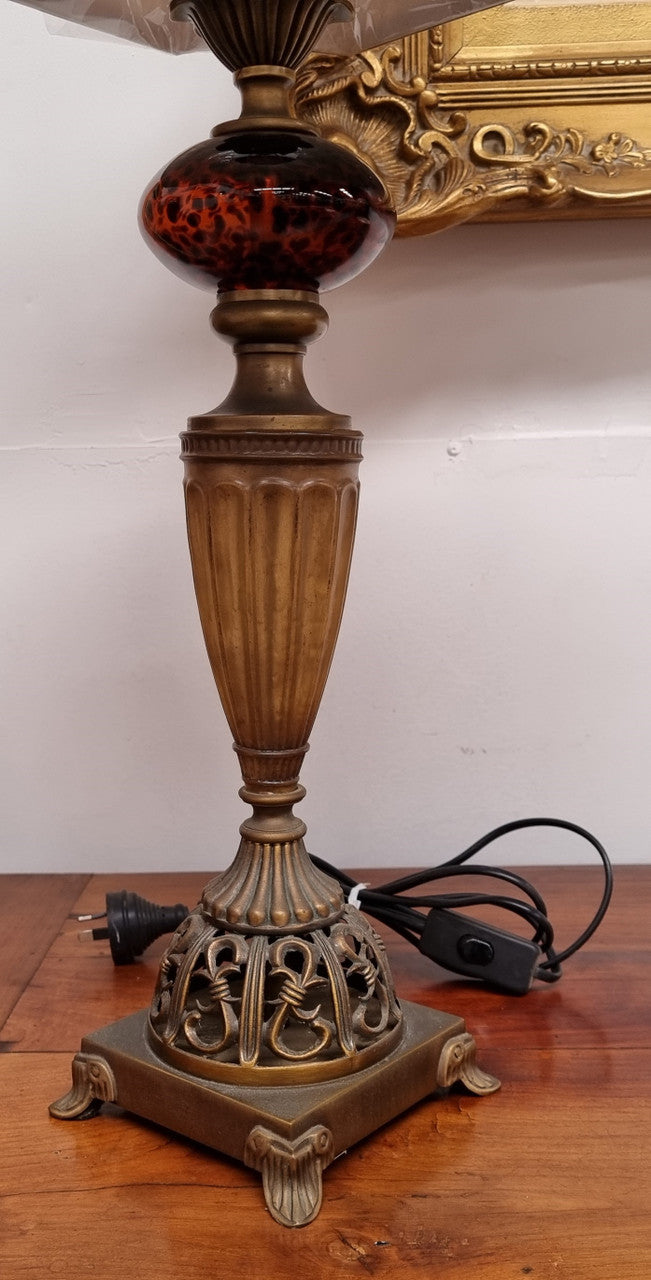 Beautiful pair of metal and glass lamp bases with new gold shades. They are in good original working condition and have been sourced locally.