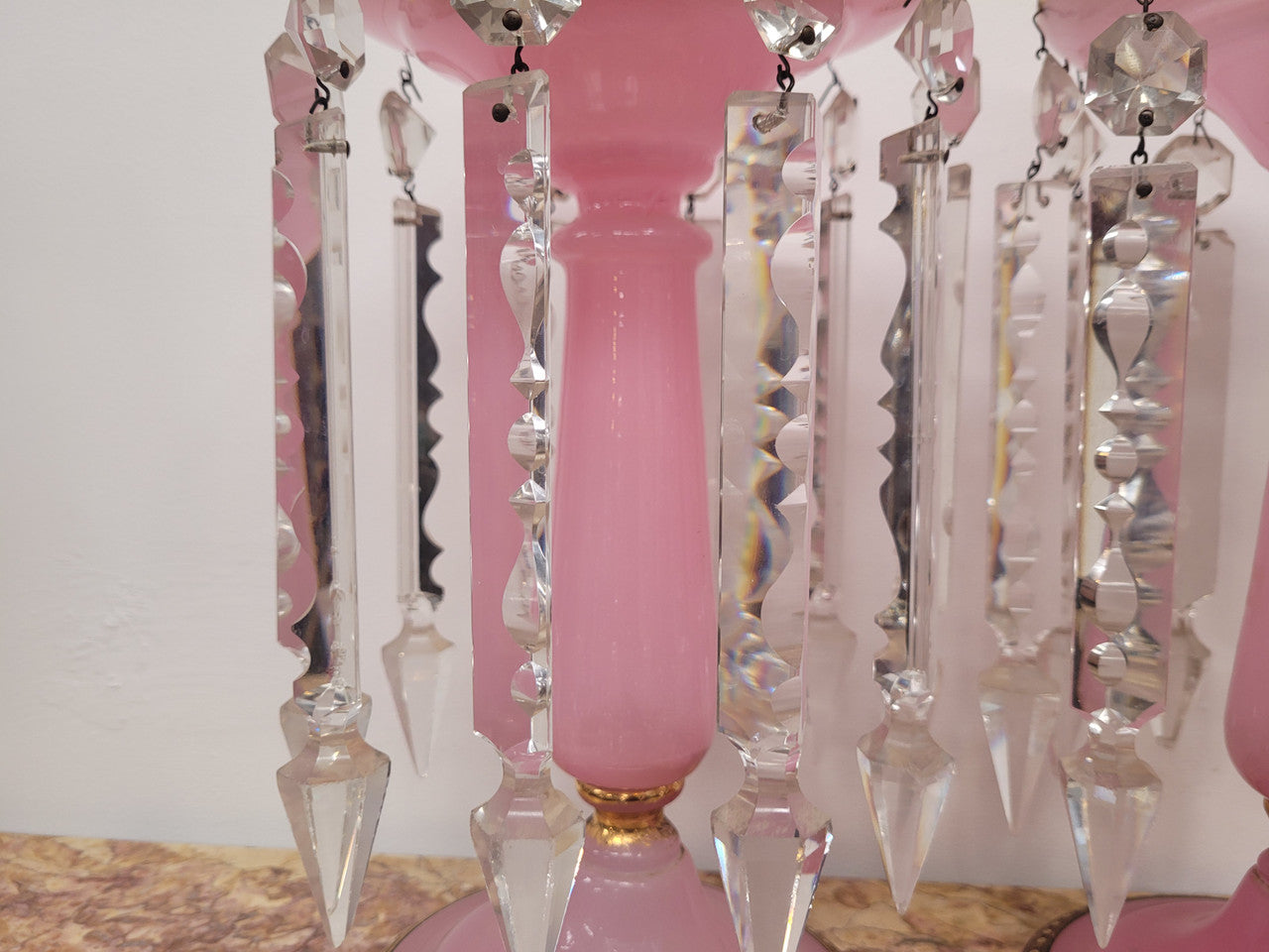 Large Victorian pink glass an gilt trim crystals lusters. It is in good original condition, please view photos as they help form part of the description.