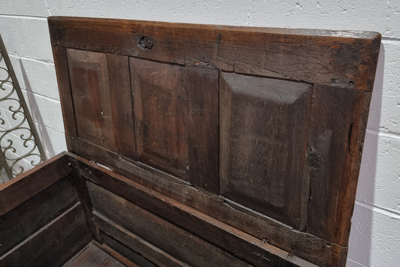 Early 19th Century French Oak carved coffer with a lift up lid for storage. A beautiful piece and in good original condition.