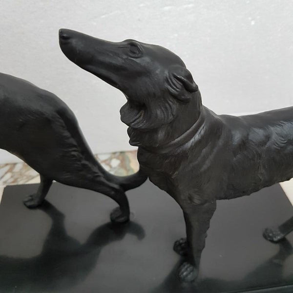 French Art Deco cold painted spelter, group of two hounds standing on a beautiful piece of marble base. Signed by Leduc and in good original condition.