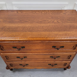 French Louis 15th style Oak three drawer chest of drawers with wooden top. It has been sourced from France and is in good original detailed condition.