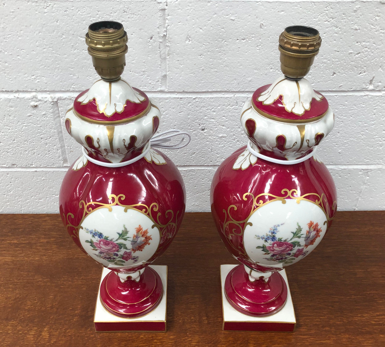 Pair of highly decorative Paris Porcelain table lamps. They are wired to Australian standards and are in very good original condition. Circa 1950's.