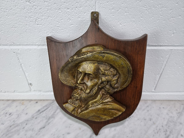 Antique Bronze plaque of a man plaque on a Mahogany panel. In good original detailed condition.