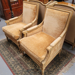 Pair of Louis XVI style painted arm chairs with carving & fluted legs. They have been sourced from France and the fabric is in good used original condition. Please view photos as they help form part of the description.