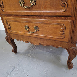 French Oak Louis XV style side drawers with lovely handles and three drawers. It has been sourced from France and is in good original detailed condition.