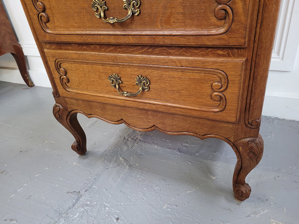 French Oak Louis XV style side drawers with lovely handles and three drawers. It has been sourced from France and is in good original detailed condition.