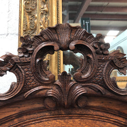 Antique French Oak Louis XV style mantle/trumeau mirror. It has its original mirror and is in good original detailed condition.