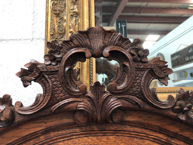 Antique French Oak Louis XV style mantle/trumeau mirror. It has its original mirror and is in good original detailed condition.