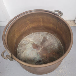 Large Antique French copper pot with wrought iron handle. It is in good original condition.