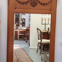 Beautiful French Oak Louis XV style carved trumeau mirror with beautiful detail. In good original detailed condition.