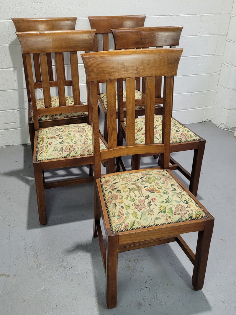 Five Blackwood dining chairs with upholstered seats. They are in good original condition including the upholstery.