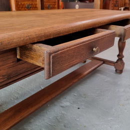 Fabulous Rustic French Oak coffee table with two drawers. It is in good original detailed condition.