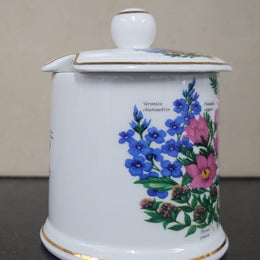 Fortnum & Mason Piccadilly London England floral decorated covered honey/jam pot. It is in good original condition with no chips or cracks, please view photos as they help form part of the description.