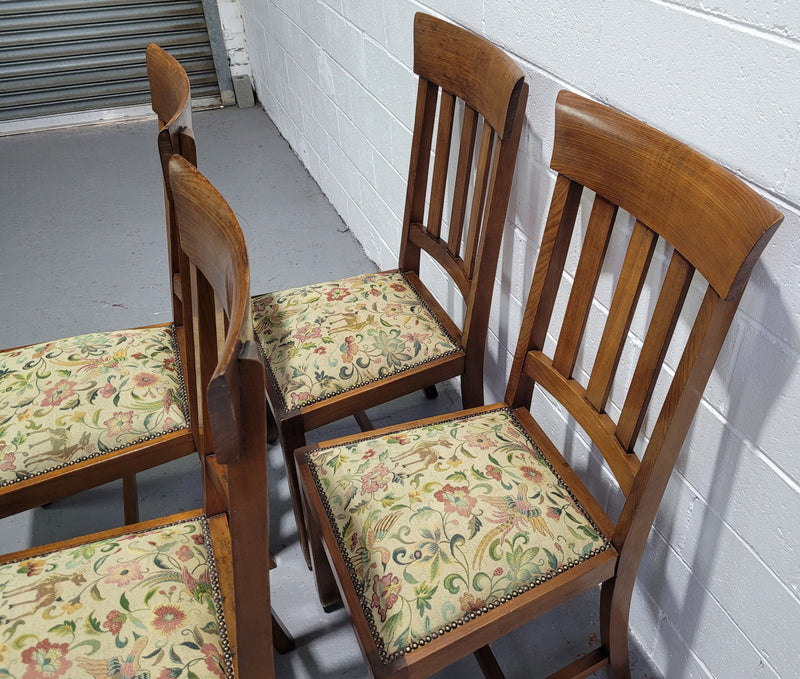 Five Blackwood dining chairs with upholstered seats. They are in good original condition including the upholstery.