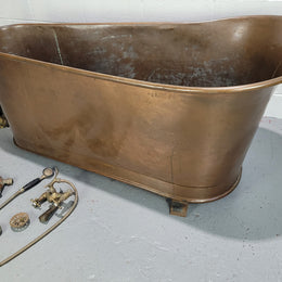 Sourced from France a rare full copper Antique bath tub on feet and includes an overflow, fittings, taps ect. In good original condition.
