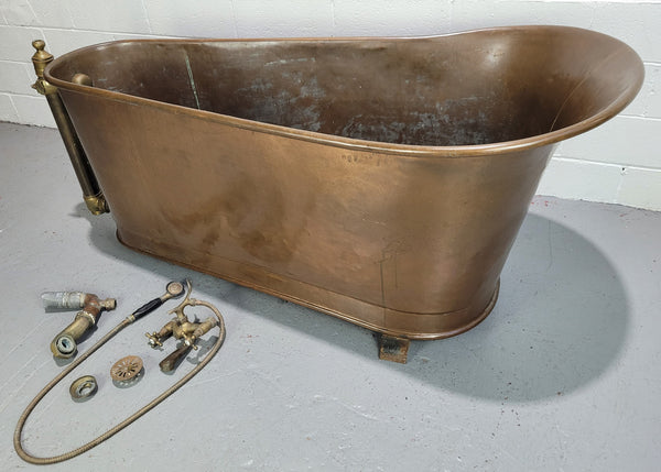 Sourced from France a rare full copper Antique bath tub on feet and includes an overflow, fittings, taps ect. In good original condition.