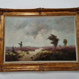 Beautifully framed oil on canvas landscape scene which is signed and in a decorative gilt frame. It is in good original condition.