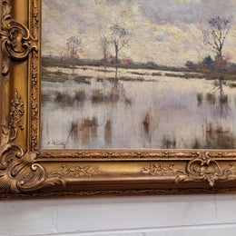 Sourced from France an impressionist oil painting of a beautiful lake scene. It is nicely framed in an Antique frame and in good original detailed condition.