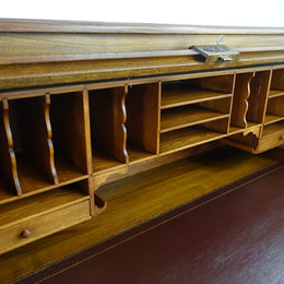 An Antique American Oak Cutler Roll Top Desk