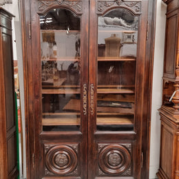 Substantial French Henry 2nd Walnut two door bookcase. It has five fully adjustable shelves and has been sourced from France. It is in good original detailed condition.