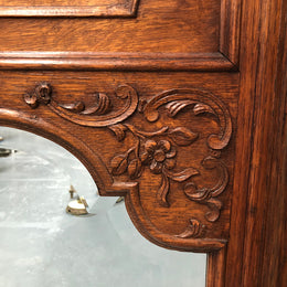 Antique French Oak Louis XV style mantle/trumeau mirror. It has its original mirror and is in good original detailed condition.
