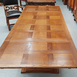 A beautiful French oak, Spanish style parquetry top extension table, with amazing carving and lovely details in very good condition.