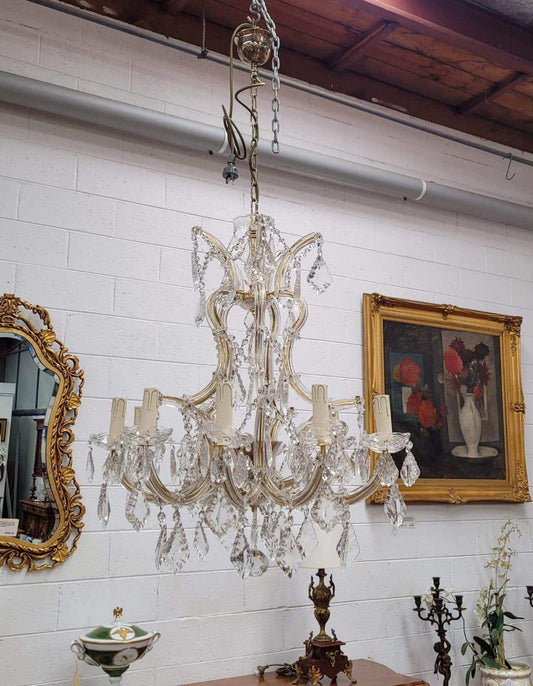 Impressive elegant ten arm French crystal chandelier that has been sourced from France. It has been fully rewired to Australian standards and is in good original working condition.