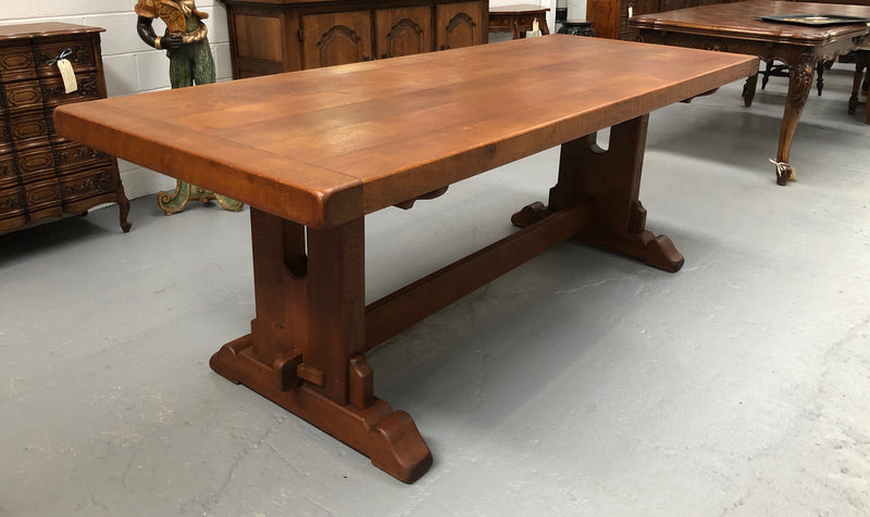 Lovely Oak French Farmhouse table with a thick plank top and lovely stretcher base. Can comfortable seat 8-10 people and is in good original detailed condition.