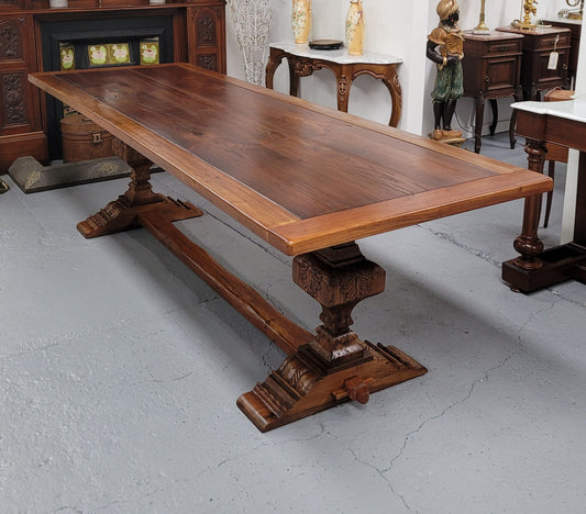 French style reclaimed Elm Farmhouse table with stretcher base and amazing carving underneath. Table can sit 10-12 people and is in good original detailed condition.