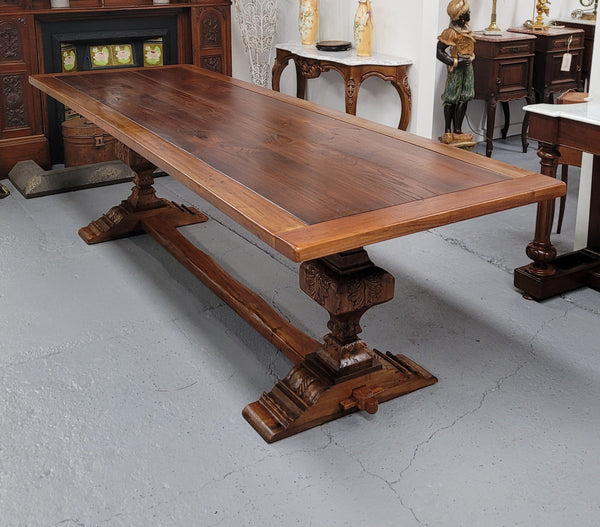 French style reclaimed Elm Farmhouse table with stretcher base and amazing carving underneath. Table can sit 10-12 people and is in good original detailed condition.