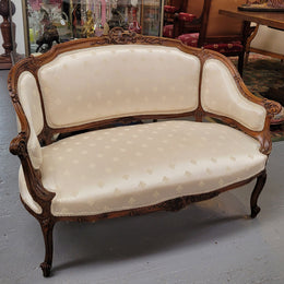 Pretty French Louis XV style small Walnut settee with very good upholstery. Sourced from France and in good original condition, please view photos of the upholstery as it helps form part of the description.