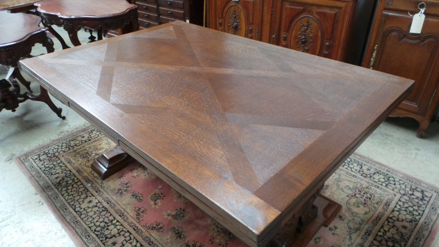 French Oak Extension Table With Carved Ornate Base