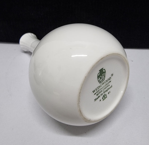 White Wedgwood metallised bone china, made in England. Stamped. In good original condition, Please view photos as they help form part of the description.