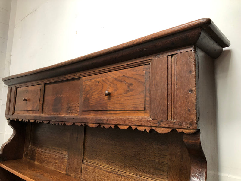 Fabulous early 19 th century French Oak open shelf bookcase, with four shelves and hidden shelf at the top with two sliding doors. In very good original detail condition.