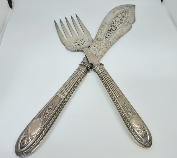 Very decorative pair of Edwardian silver plate Fish servers, in good original condition.