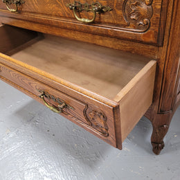 French Louis XV style Oak three drawer chest with wooden top. It has been sourced from France and is in good original detailed condition.